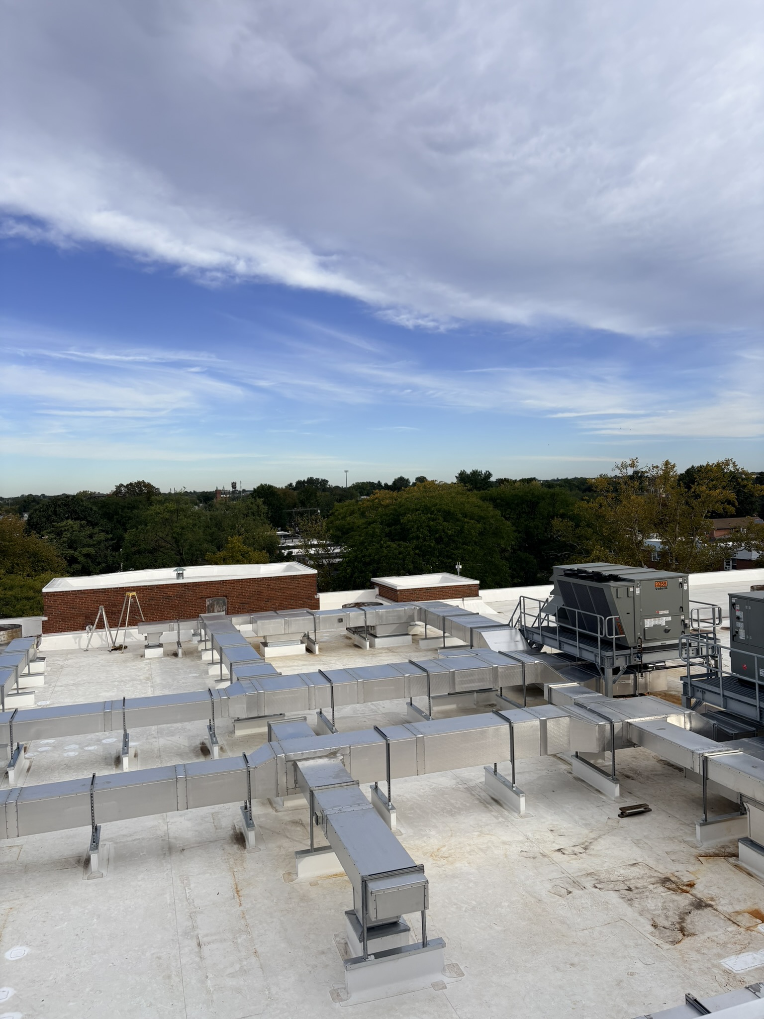 Custom sheet metal ductwork and mechanical equipment installed on a rooftop